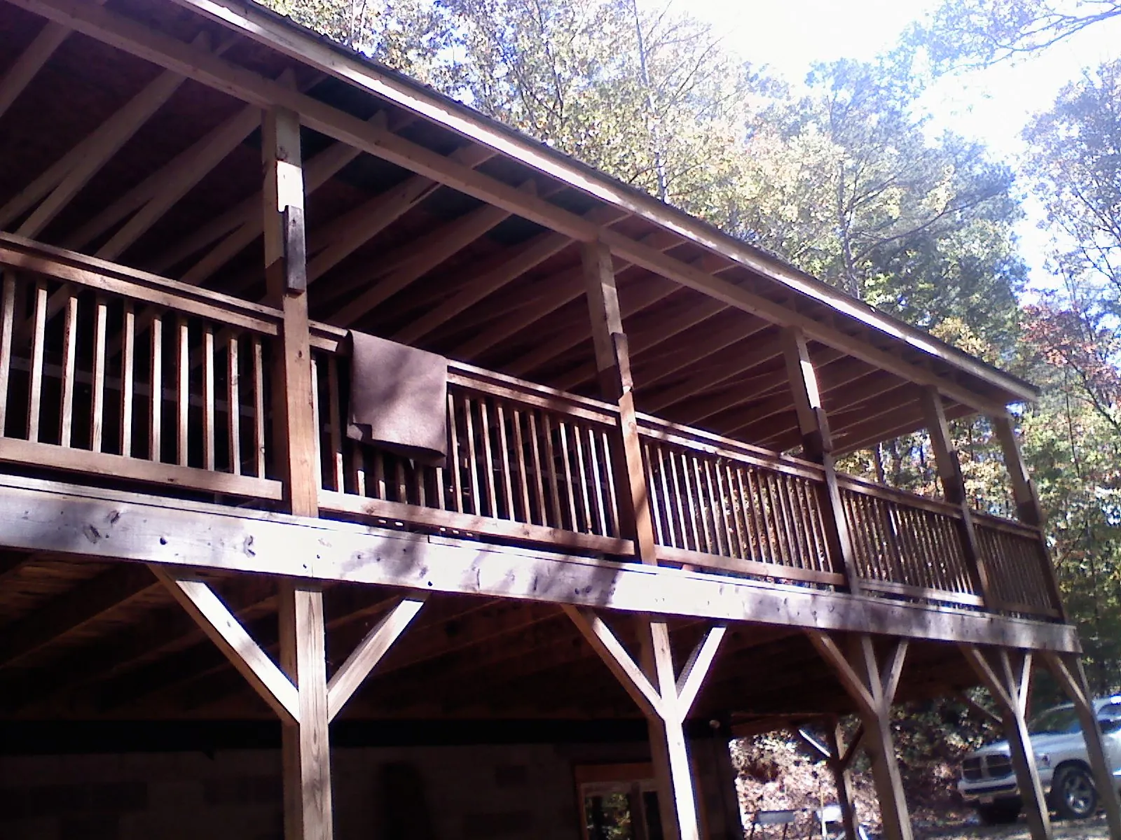 Timber framing under a new elevated porch and deck — Roof Leak Repair in Happy Valley by Roofing Brothers